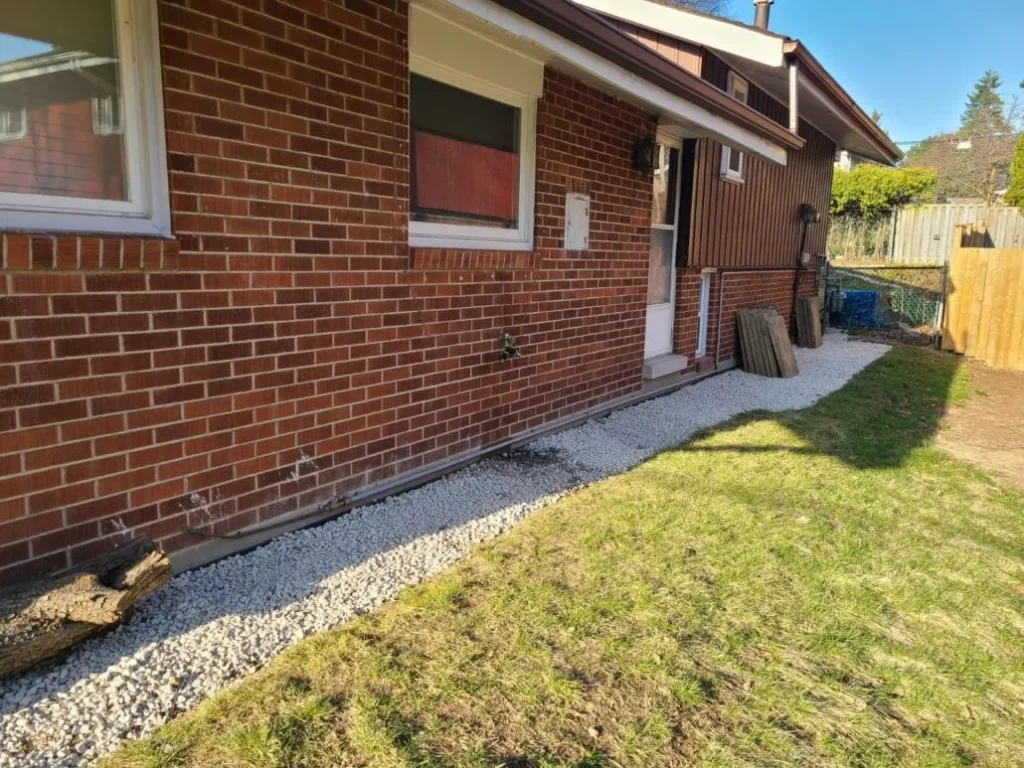 Technicians installing waterproof roof membranes on a commercial building in NYC.